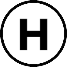 Website logo: capital H in a circle.